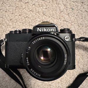 Nikon FE camera and lens